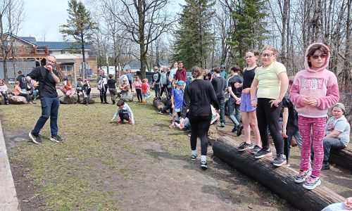 Students take part in Indigenous Learning in an outdoor classroom.